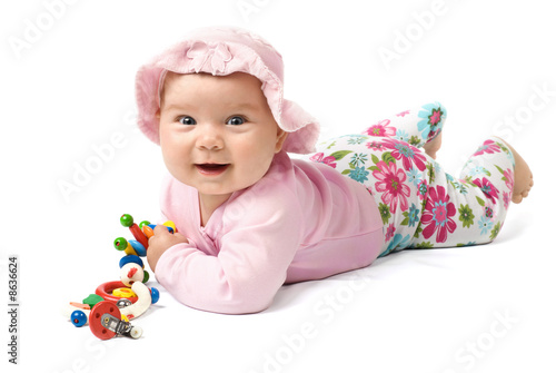 Laying baby in pink clothes