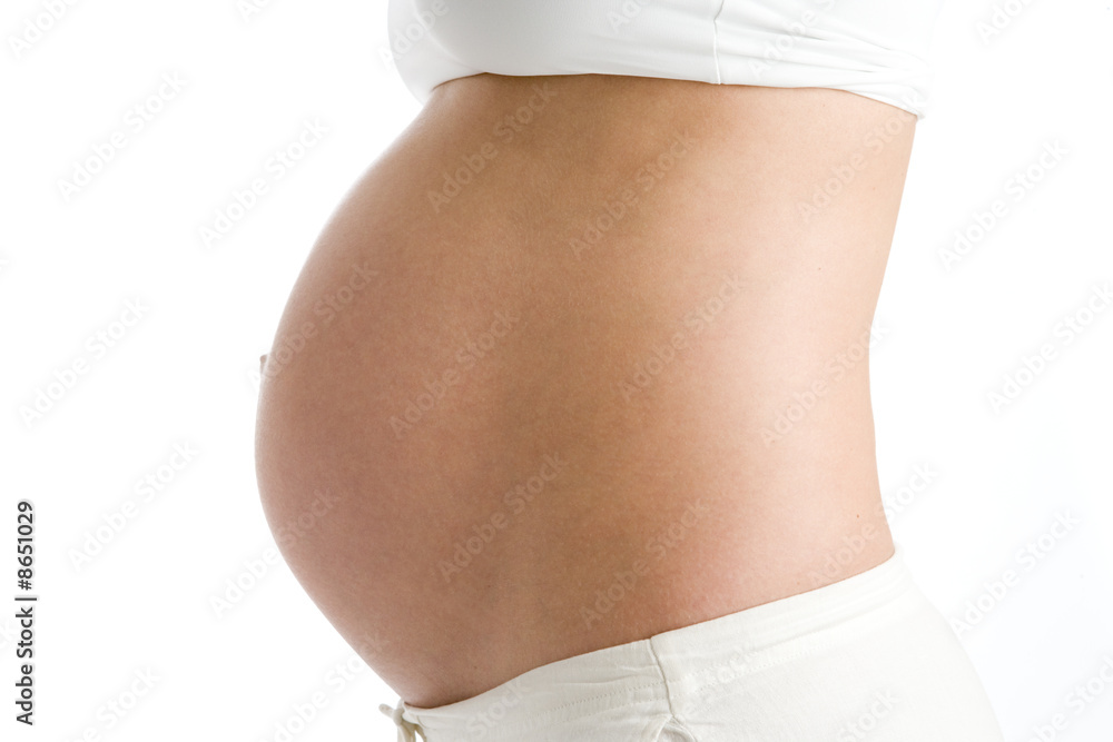 Pregnant woman's exposed belly Pregnant woman's exposed belly