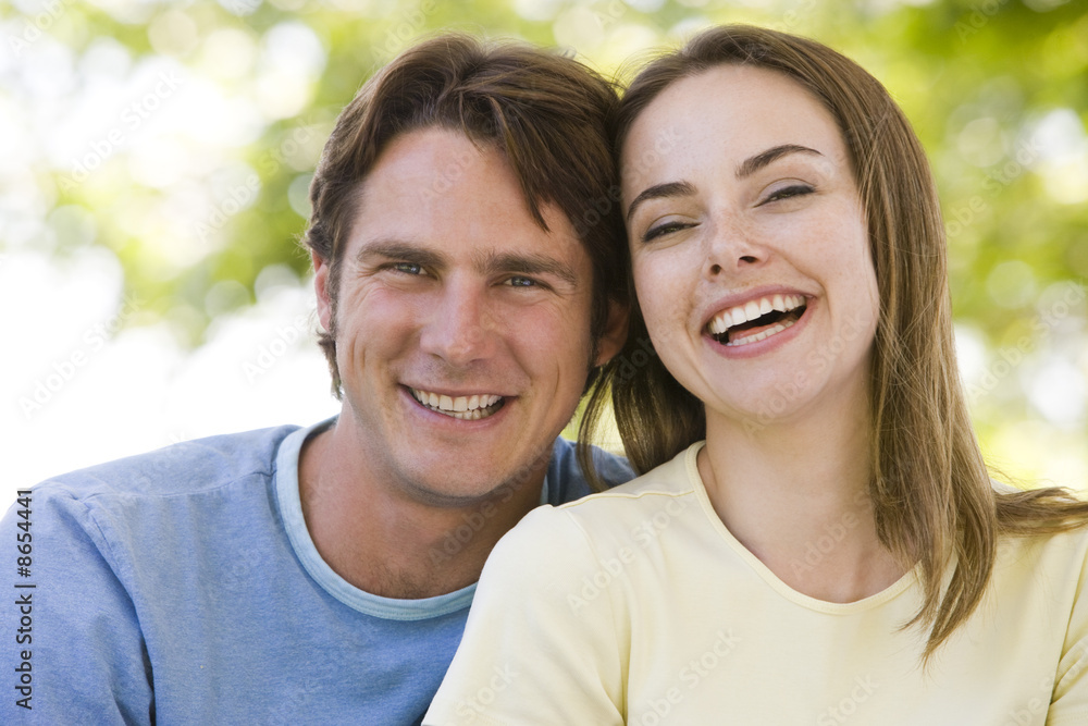Couple outdoors smiling
