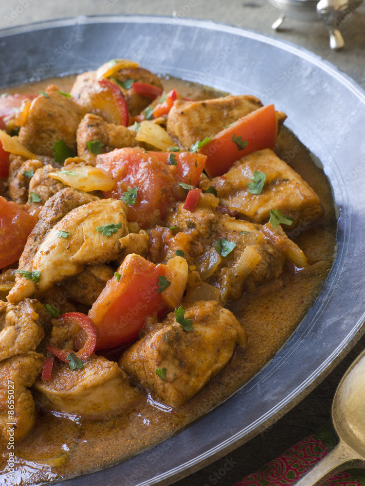 Chicken Bhoona in a Pewter dish Chicken Bhoona in a Pewter dish