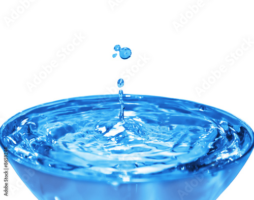 Water Drops falling and splash in cup
