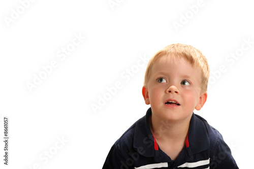 Young boy looking up