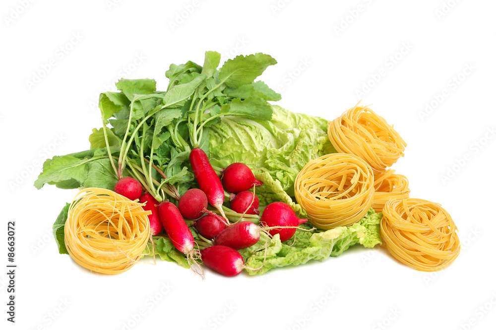 Uncooked macaroni, radish and chinese lettuce leaves Uncooked macaroni, radish and chinese lettuce leaves