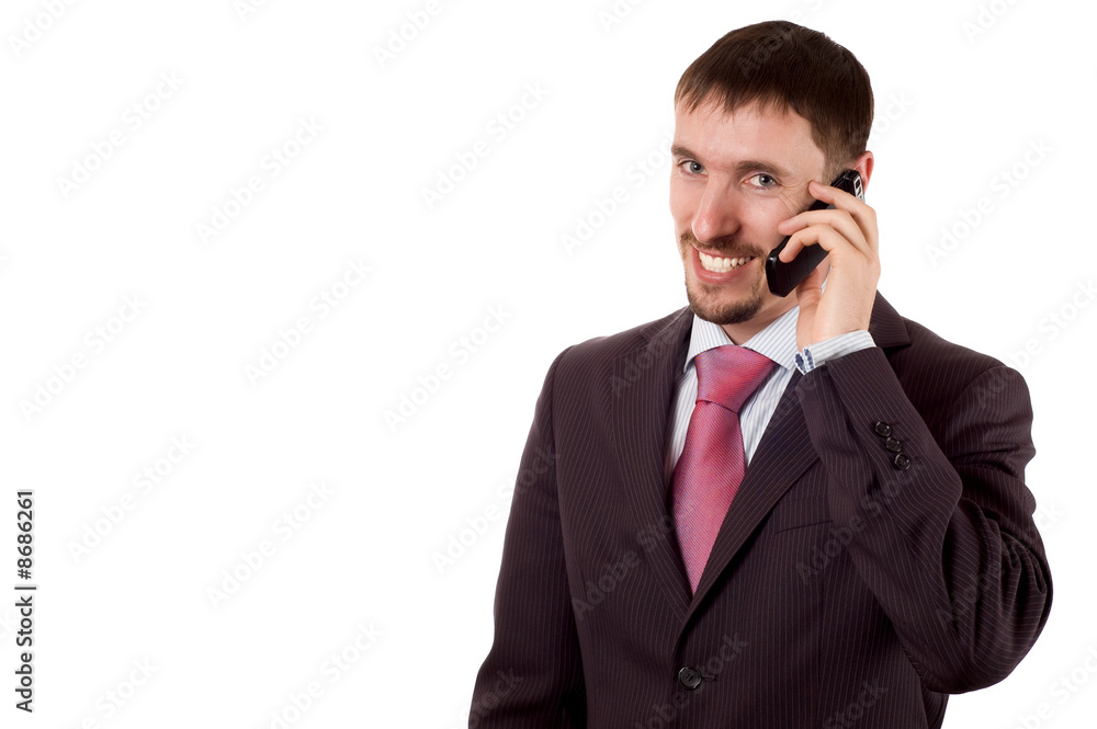 young modern business man talking on cell phone (isolated on whi young modern business man talking on cell phone (isolated on whi