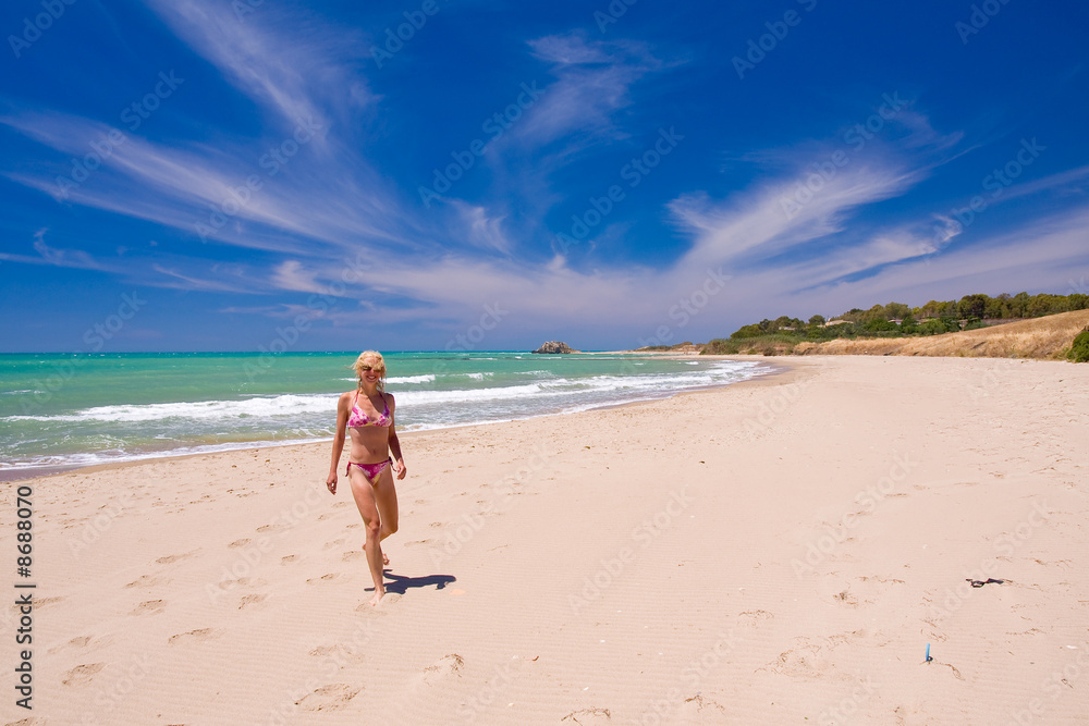 a beutiful woman on the beach in Mediterranean