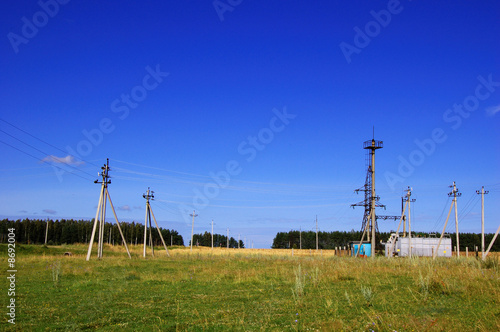 Regulators and buswork inside an electric utility substation photo