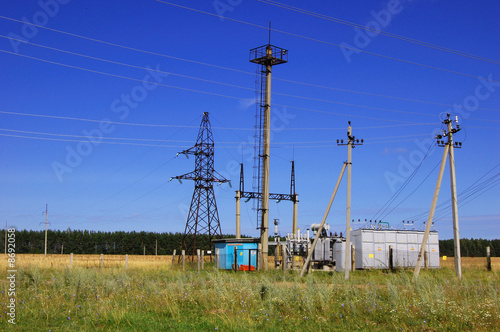 Regulators and buswork inside an electric utility substation photo