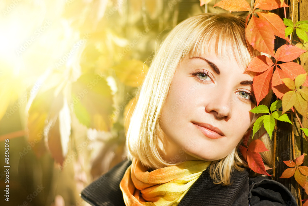 Beautiful young woman on autumn background Beautiful young woman on autumn background