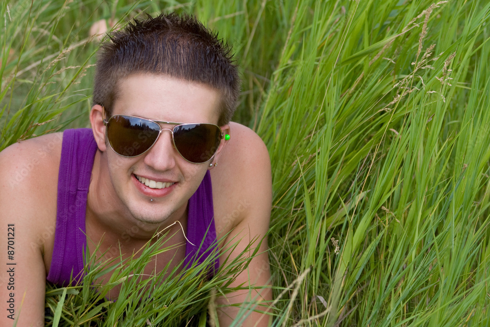 Man lying in grass Man lying in grass