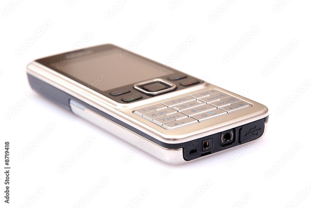Modern silver mobile phone close-up isolated on white Modern silver mobile phone close-up isolated on white