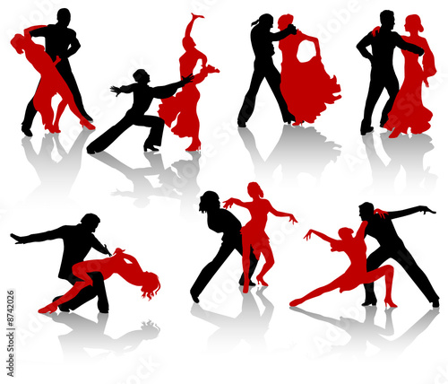 Silhouettes of the pairs dancing ballroom dances