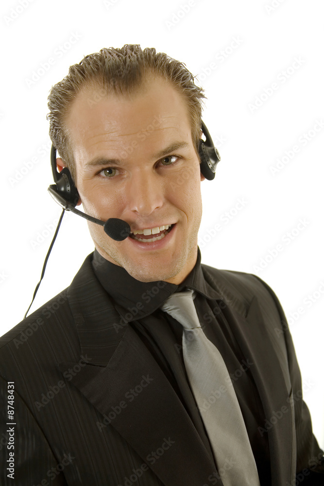 Successful young businessman wearing headphones Successful young businessman wearing headphones