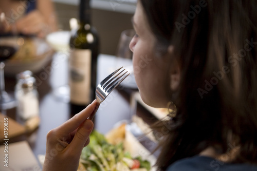Woman eating at a cafe
