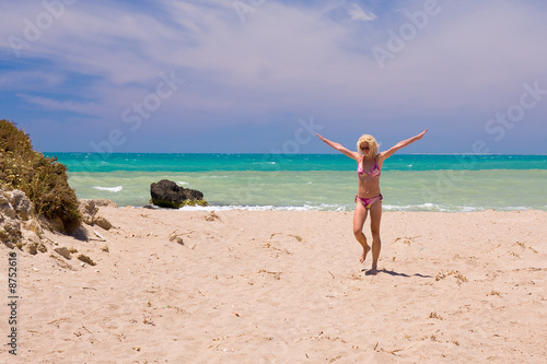 a beutiful woman on the beach in Mediterranean