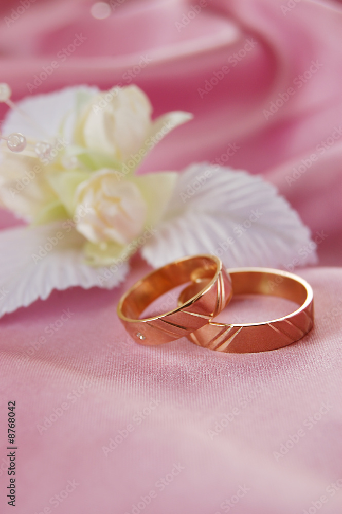 wedding golden rings with decoration on pink satin wedding golden rings with decoration on pink satin