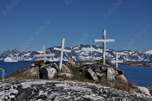 Cemetary of Qernertivartivit village - four crosses on the rocks