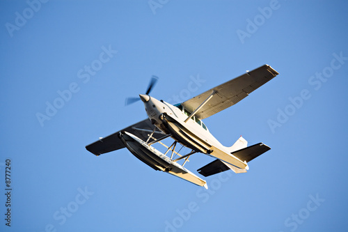 seaplane in flight against blue sky