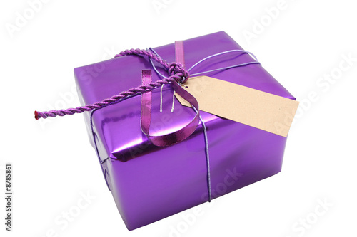 A wrapped present with blank label on it,