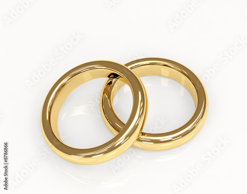 Two 3d gold wedding ring. Objects over white
