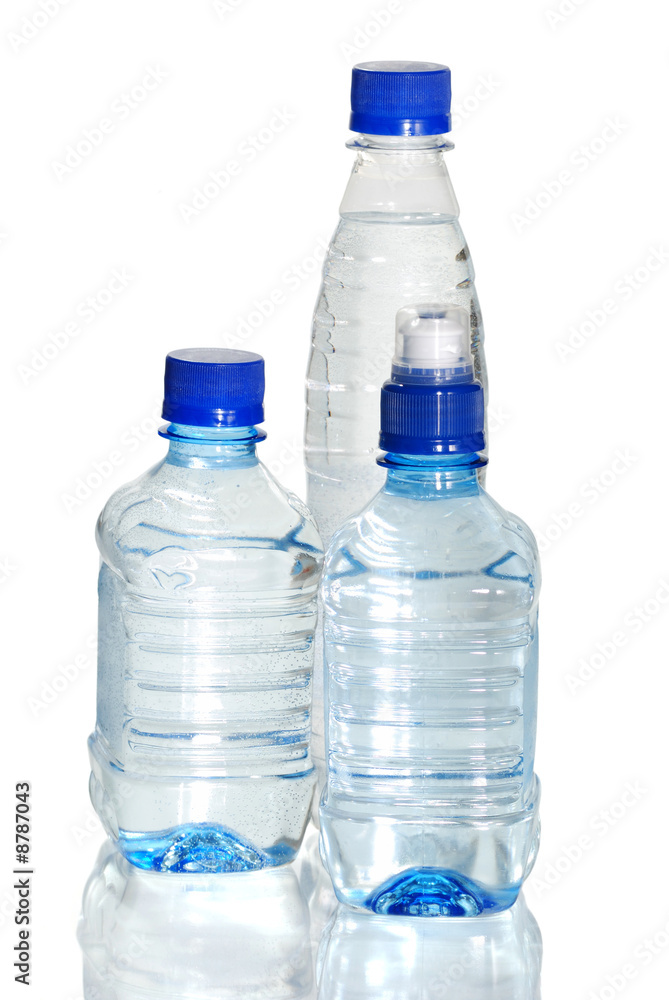 Bottle of water. Isolated on white, with reflection. Bottle of water. Isolated on white, with reflection.