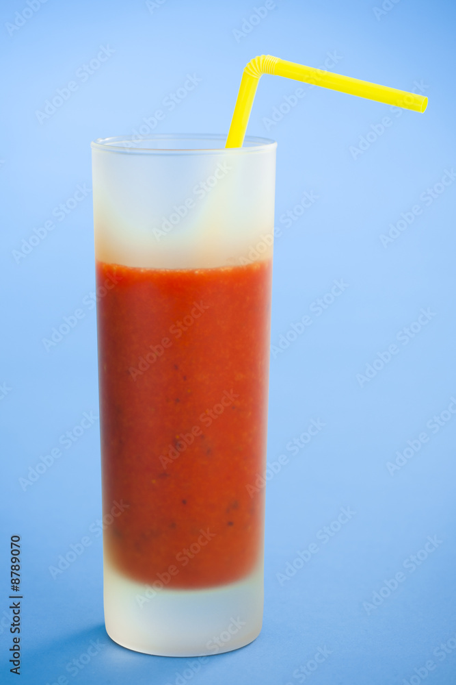 Strawberry smoothie over a light blue background Strawberry smoothie over a light blue background