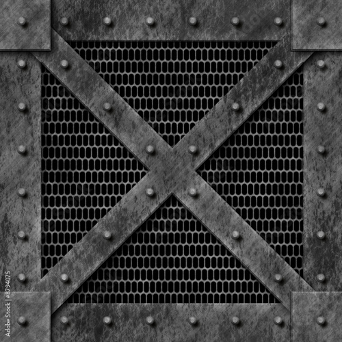 A metal plate with rivets and wire meshing.