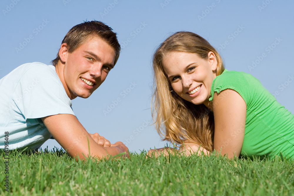 happy smiling young couple relaxing outdoors happy smiling young couple relaxing outdoors