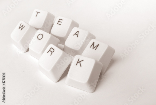 Computer keys with teamwork word photo