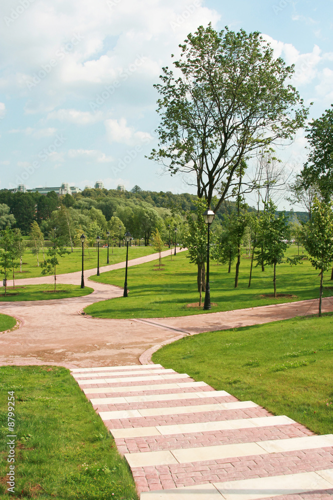 Beautiful well-groomed park with paths and a lawn Beautiful well-groomed park with paths and a lawn