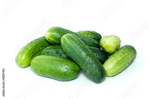 Pile of cucumbers isolated on the white background