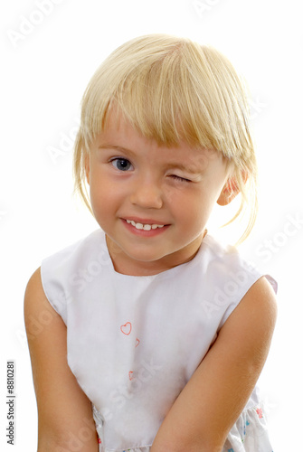 The little girl with a smile and wink