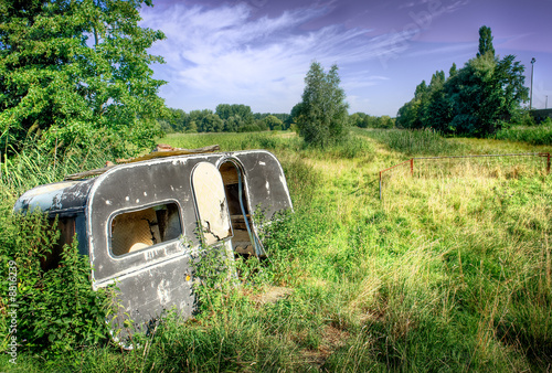 old,worn down caravan in nature. High dynamic range image.