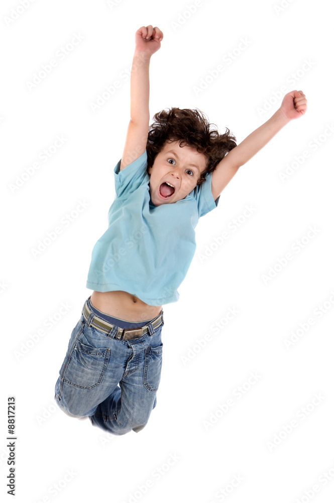 Adorable child jumping a over white background Adorable child jumping a over white background