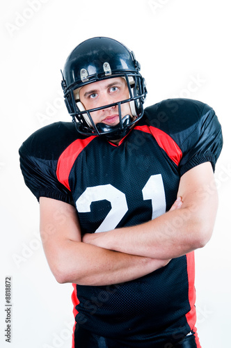 American football player in helmet, isolated on white background