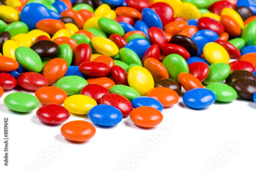 Assortment of Colorful Chocolate Candies on White Background