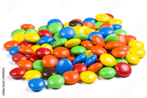 Assortment of Colorful Chocolate Candy on White Background