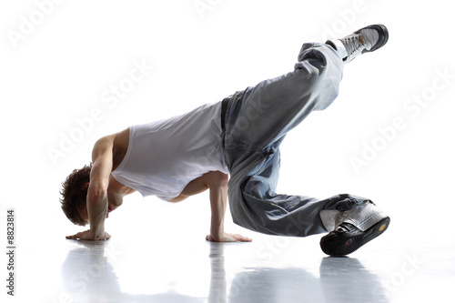 stylish and cool breakdance style dancer posing photo