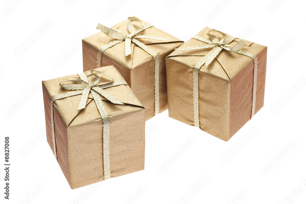 Three gift boxes with bow ribbons on white background Three gift boxes with bow ribbons on white background