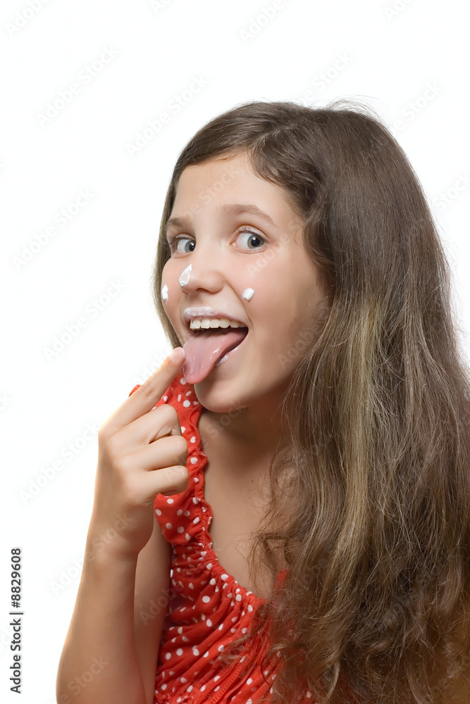 Beauty teen girl eat cream isolated on white for your design Beauty teen girl eat cream isolated on white for your design