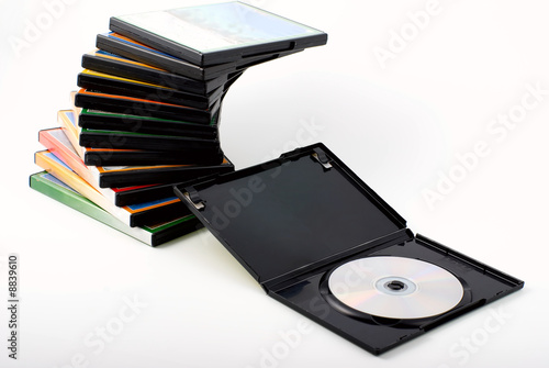 Stack of packages and an open box dvd movies photo
