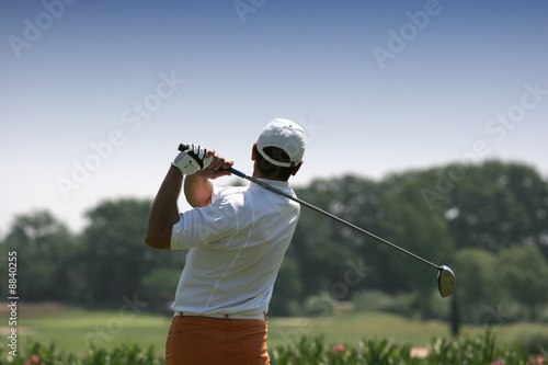 young man golf swing