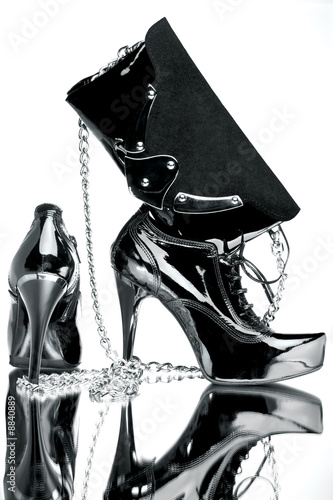 Two shoes with chain