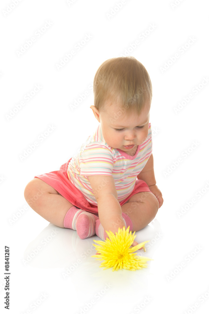 Sitting small baby with yellow flower #2 isolated Sitting small baby with yellow flower #2 isolated