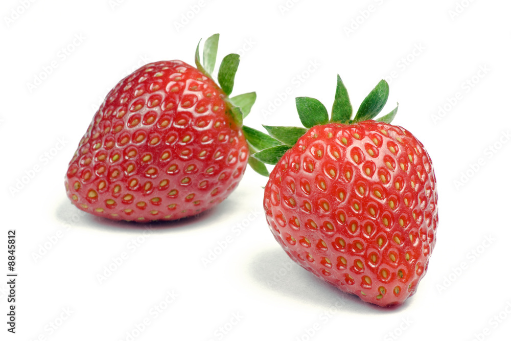 Two ripe strawberries on white background Two ripe strawberries on white background