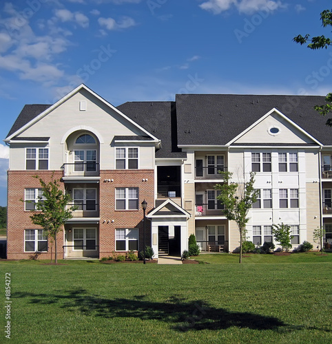Facade of an upscale suburban apartment building.