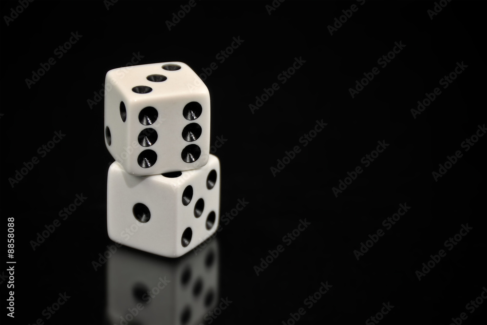 Stacked White Dice on Black Background Stacked White Dice on Black Background