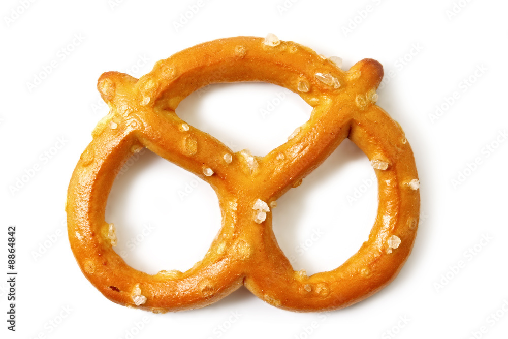 Single salted pretzel, casting shadow on white. Single salted pretzel, casting shadow on white.