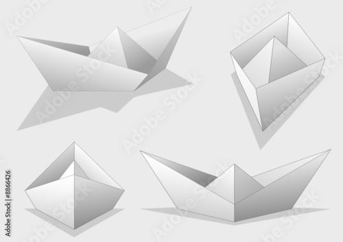 Four white isolated paper ships