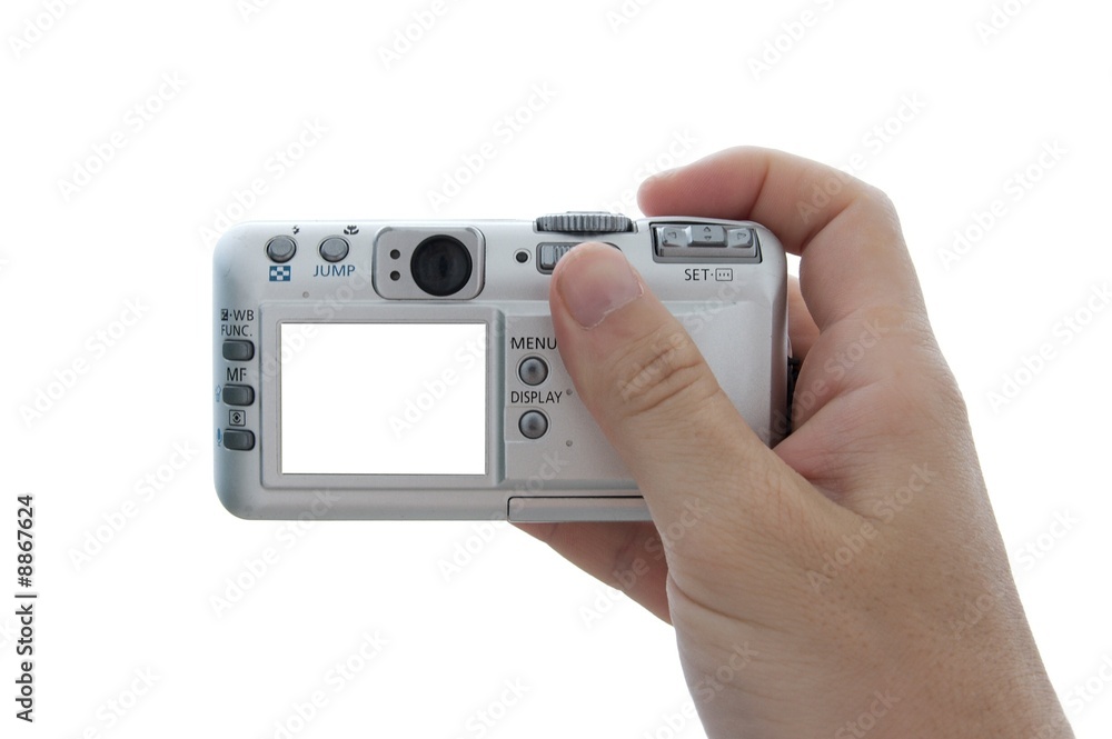 Digital camera in hand with blank white screen Digital camera in hand with blank white screen
