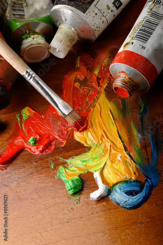 Paint brushes on art pallette